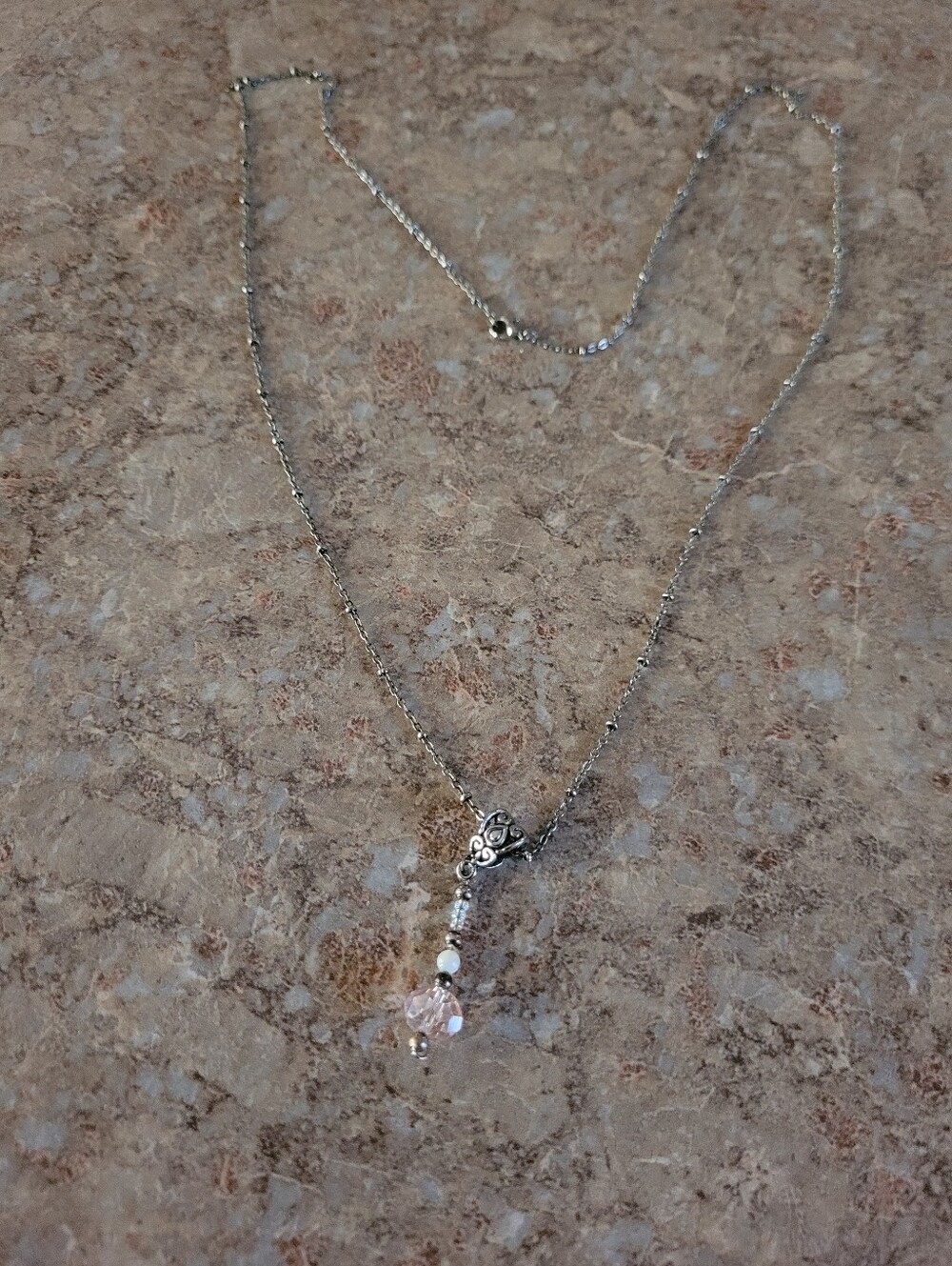Silver-Tone Pendant Necklace with Pink Crystal Accent